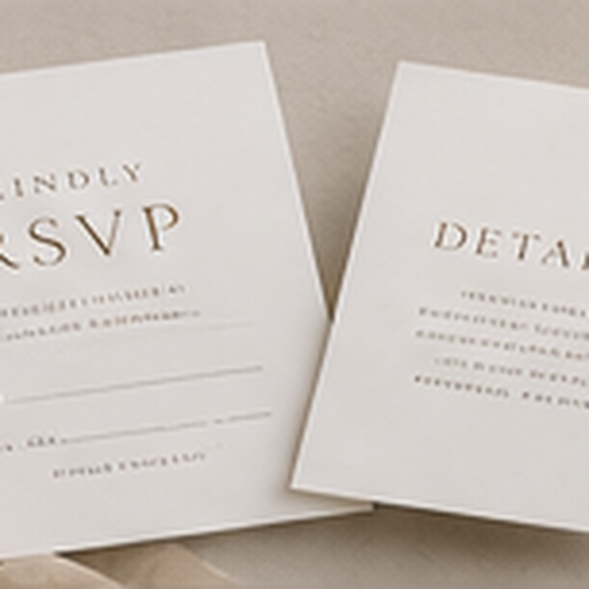 Finished wedding RSVP and details cards shown as a professional stationery print set