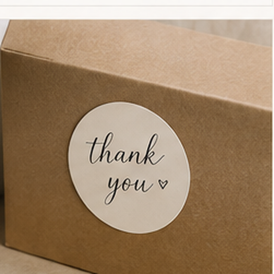 Custom wedding sticker applied to a neutral favor box