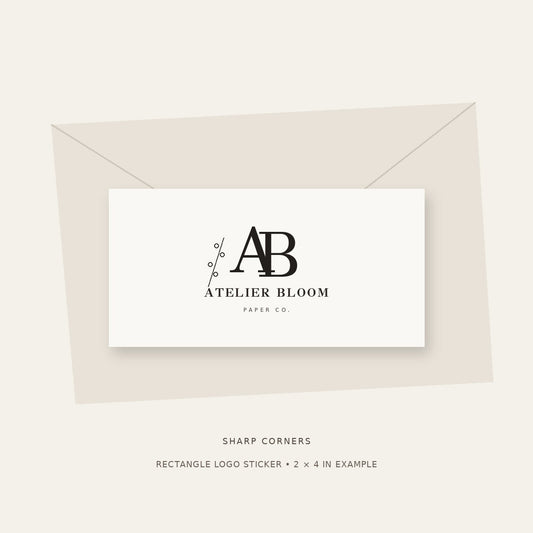 Rectangle logo sticker with sharp corners, shown with sample Atelier Bloom branding
